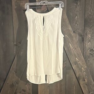 Elegant White Sleeveless Top with Lace Accent